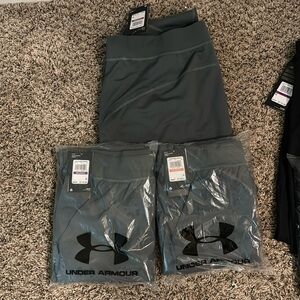 3 pairs of grey RUSH performance joggers by Under Armour. 2 pairs XXL, 1 pair 3X